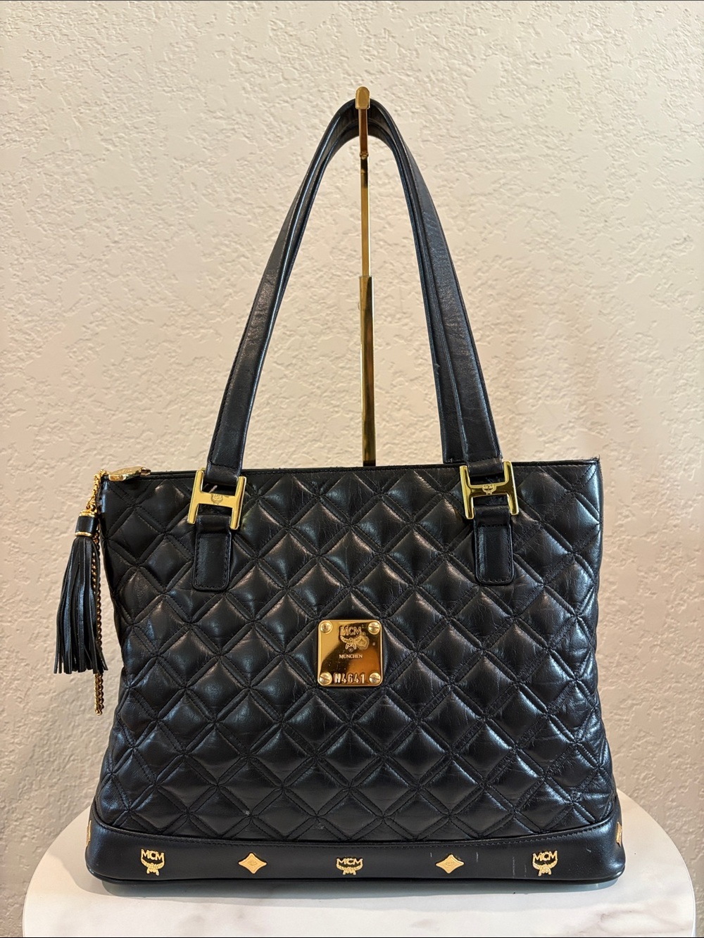 MCM Quilted Black Leather Tote with Gold Plaque and Tassel